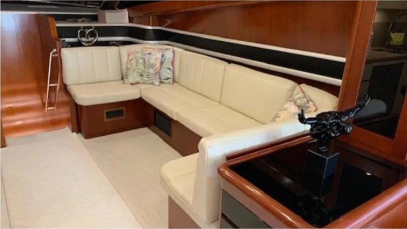  Yacht Photos Pics Luxurious interior of a 2005 Posillipo 65 yacht with cream leather seating.