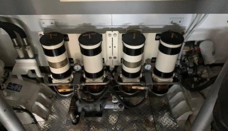  Yacht Photos Pics Engine room of a 2005 Posillipo 65 yacht, featuring four cylindrical components.