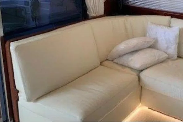  Yacht Photos Pics Luxurious cream leather seating on a 2005 Posillipo 65 yacht interior.