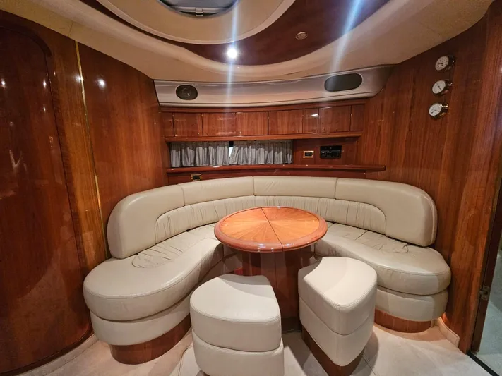 Bruno Dessi Yacht Photos Pics Luxurious 2006 Cranchi Mediterranee 50 HT yacht interior with elegant wood and leather seating.