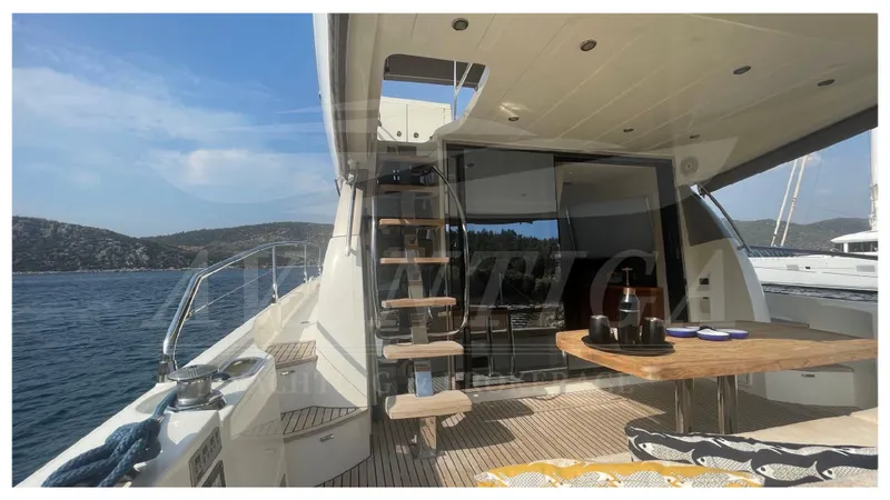  Yacht Photos Pics Luxury 2012 Prestige 500 yacht interior with elegant seating and scenic ocean view.