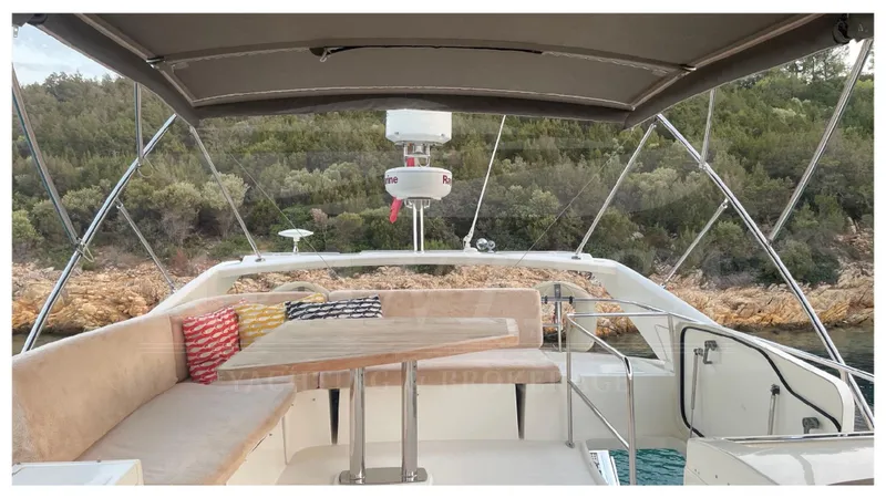  Yacht Photos Pics Luxurious 2012 Prestige 500 yacht with outdoor seating and scenic view.