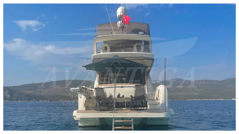  Yacht Photos Pics 2012 Prestige 500 yacht on calm sea with clear sky backdrop.