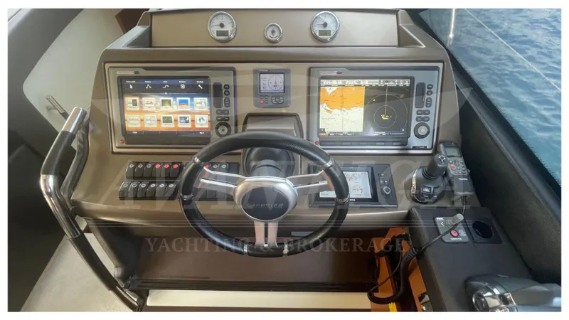  Yacht Photos Pics Helm of 2012 Prestige 500 yacht with advanced navigation systems and controls.