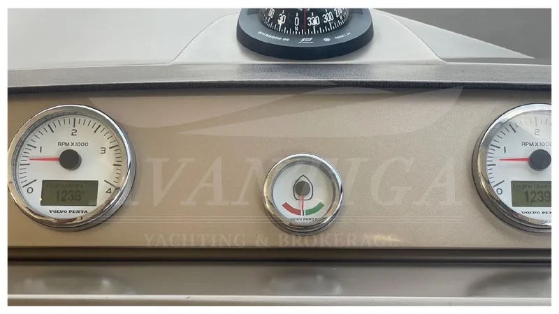  Yacht Photos Pics Control panel of a 2012 Prestige 500 yacht with gauges and compass.