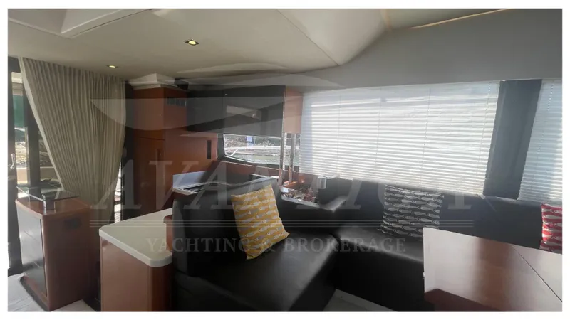  Yacht Photos Pics Luxurious interior of 2012 Prestige 500 yacht with modern furnishings and large windows.