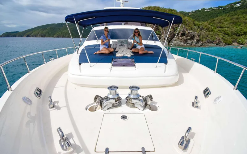  Yacht Photos Pics 2006 Ferretti Yachts 881 model cruising with passengers on deck.