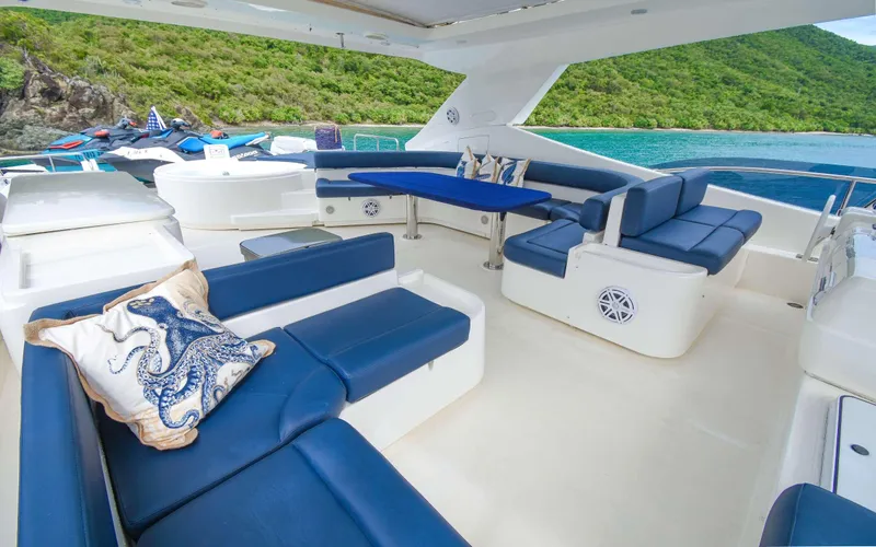  Yacht Photos Pics Luxurious 2006 Ferretti Yachts 881 with elegant blue and white seating, scenic ocean view.