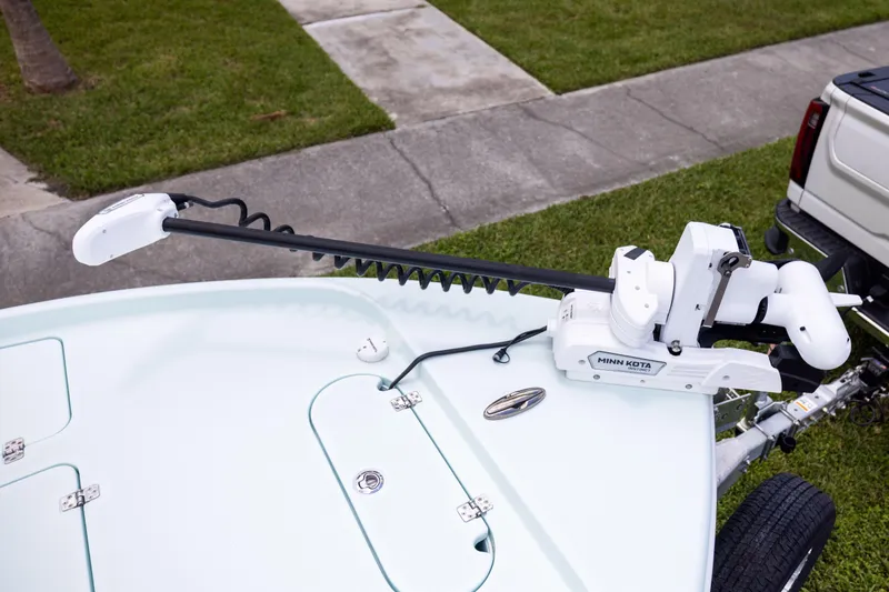  Yacht Photos Pics 2024 Yellowfin 24 CE boat with Minn Kota trolling motor on trailer.