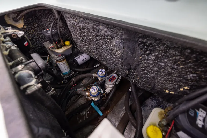  Yacht Photos Pics 2024 Yellowfin 24 CE boat engine compartment with wiring and components.