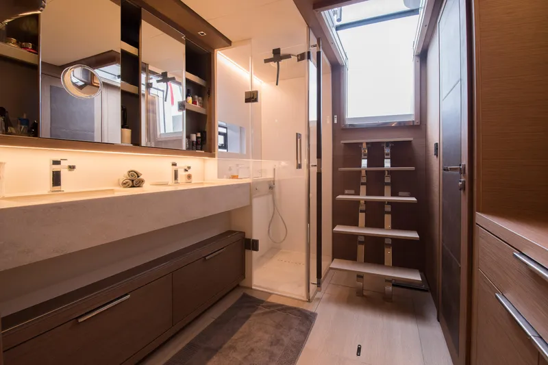 Mahe III Yacht Photos Pics Luxurious bathroom interior of 2023 Lagoon SIXTY 7 yacht with modern fixtures and elegant design.