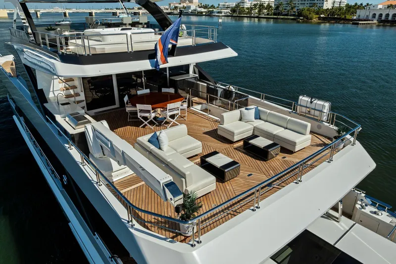 Serenity Now Yacht Photos Pics Luxurious 2024 Ocean Alexander 35 Revolution yacht with spacious deck and elegant seating area.