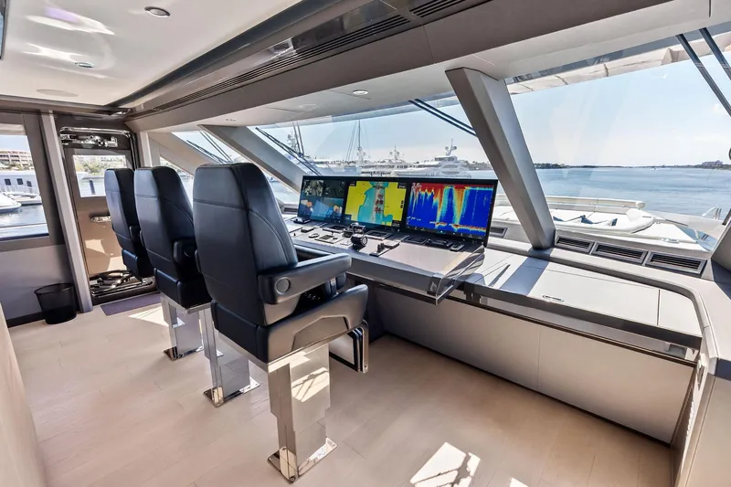 Serenity Now Yacht Photos Pics Pilothouse of 2024 Ocean Alexander 35 Revolution yacht with advanced navigation systems.