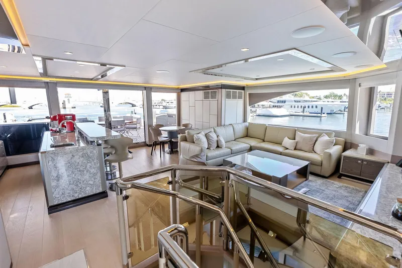 Serenity Now Yacht Photos Pics Luxurious interior of 2024 Ocean Alexander 35 Revolution yacht with modern furnishings and panoramic views.