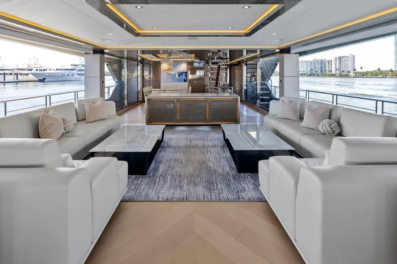 Serenity Now Yacht Photos Pics Luxurious interior of 2024 Ocean Alexander 35 Revolution yacht with elegant seating and modern design.