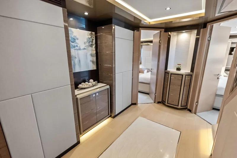 Serenity Now Yacht Photos Pics Luxurious interior of 2024 Ocean Alexander 35 Revolution yacht, featuring elegant wood finishes and modern decor.