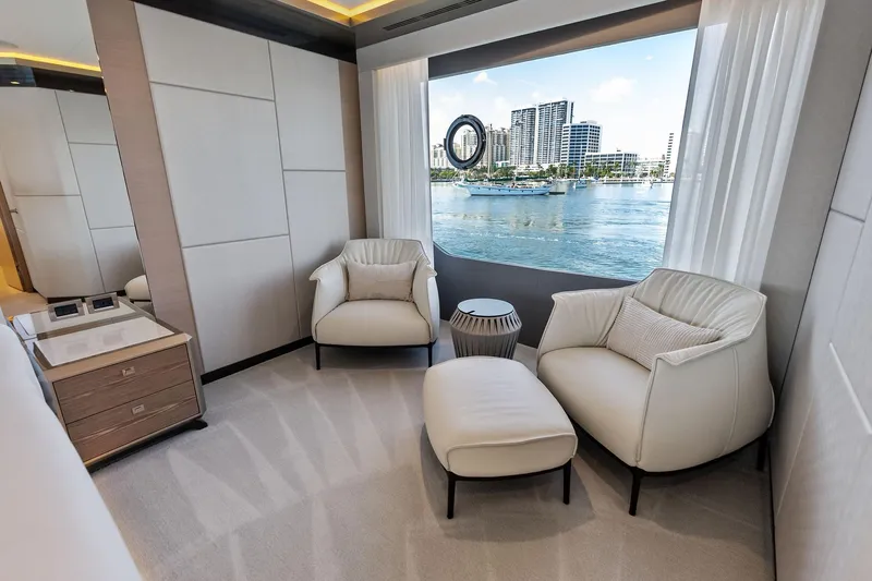 Serenity Now Yacht Photos Pics Luxurious interior of 2024 Ocean Alexander 35 Revolution yacht with waterfront view.