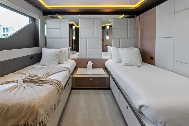 Serenity Now Yacht Photos Pics Luxurious twin cabin interior of 2024 Ocean Alexander 35 Revolution yacht.