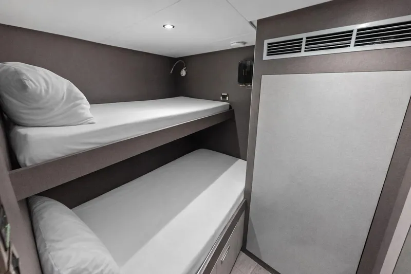 Serenity Now Yacht Photos Pics 2024 Ocean Alexander 35 Revolution yacht cabin with bunk beds and modern design.