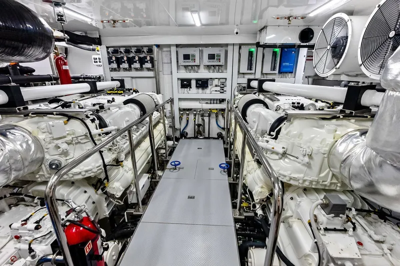 Serenity Now Yacht Photos Pics Engine room of 2024 Ocean Alexander 35 Revolution yacht, showcasing advanced machinery and controls.