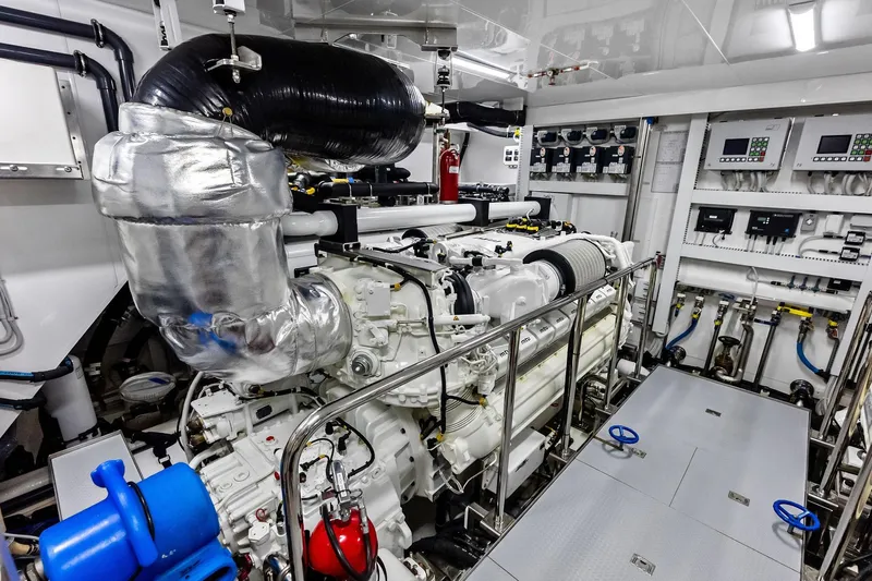 Serenity Now Yacht Photos Pics Engine room of 2024 Ocean Alexander 35 Revolution yacht, showcasing advanced machinery and controls.