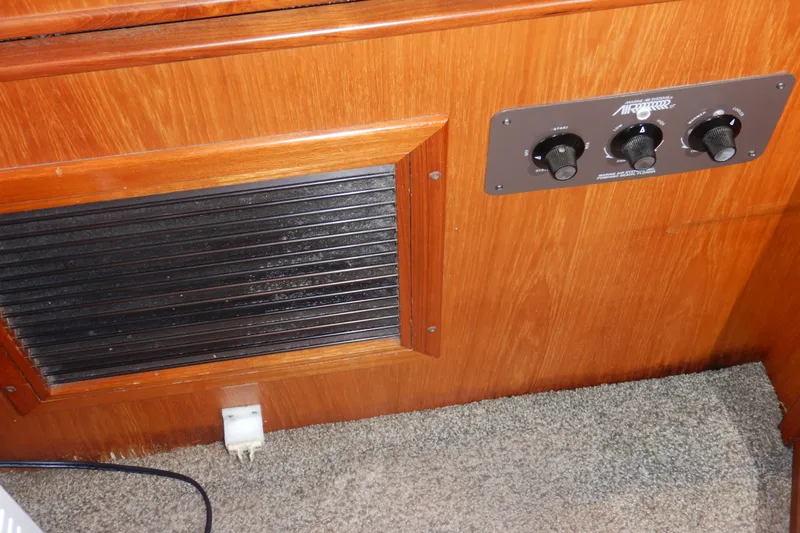 Alaska Sea Duction Yacht Photos Pics 1988 Camargue 48 Cockpit Motor Yacht interior with control panel and vent.