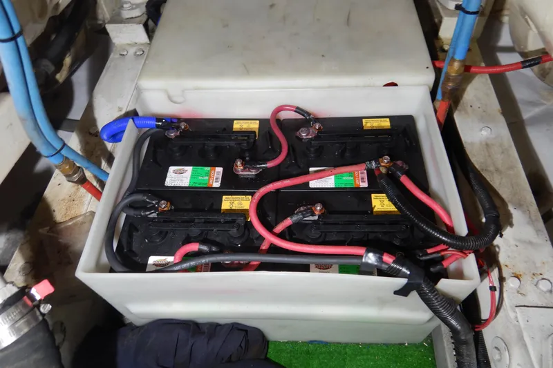Alaska Sea Duction Yacht Photos Pics Battery compartment of a 1988 Camargue 48 Cockpit Motor Yacht with wiring connections.