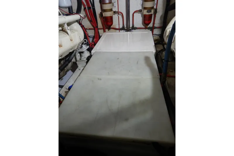 Alaska Sea Duction Yacht Photos Pics Engine room of 1988 Camargue 48 Cockpit Motor Yacht with visible components.