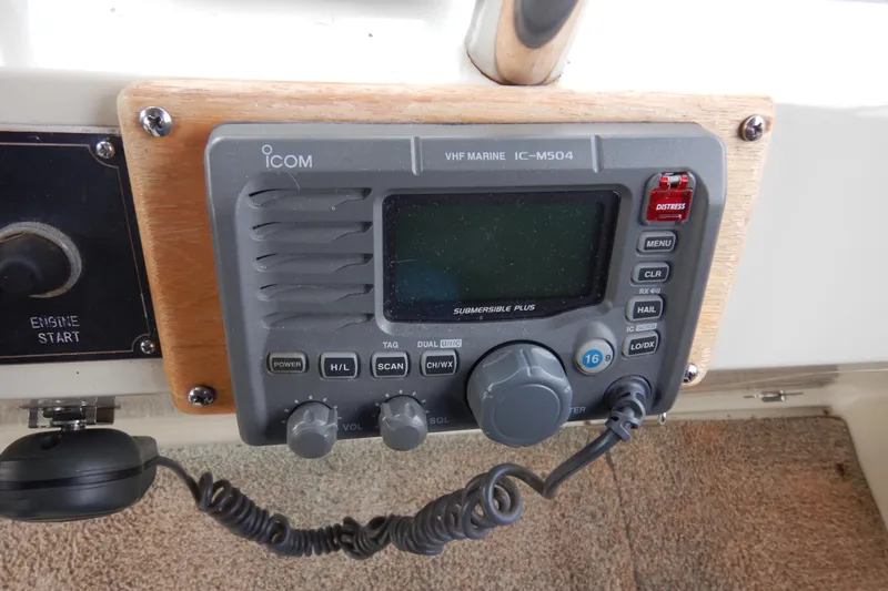 Alaska Sea Duction Yacht Photos Pics VHF marine radio on 1988 Camargue 48 Cockpit Motor Yacht dashboard.