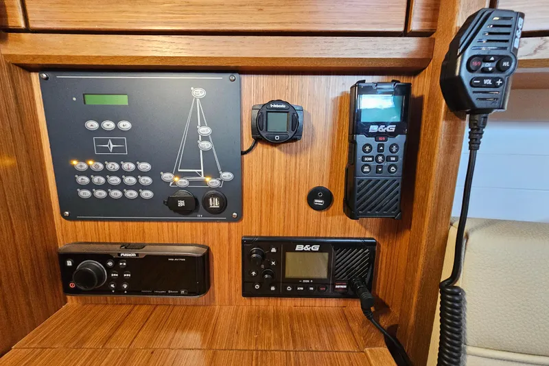 Skal Yacht Photos Pics Control panel of a 2021 Bavaria Cruiser 34 yacht with navigation and communication equipment.