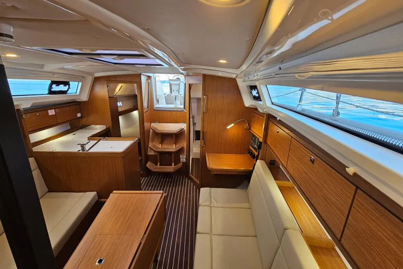 Skal Yacht Photos Pics Interior of 2021 Bavaria Cruiser 34 yacht, featuring modern wood finish and comfortable seating.