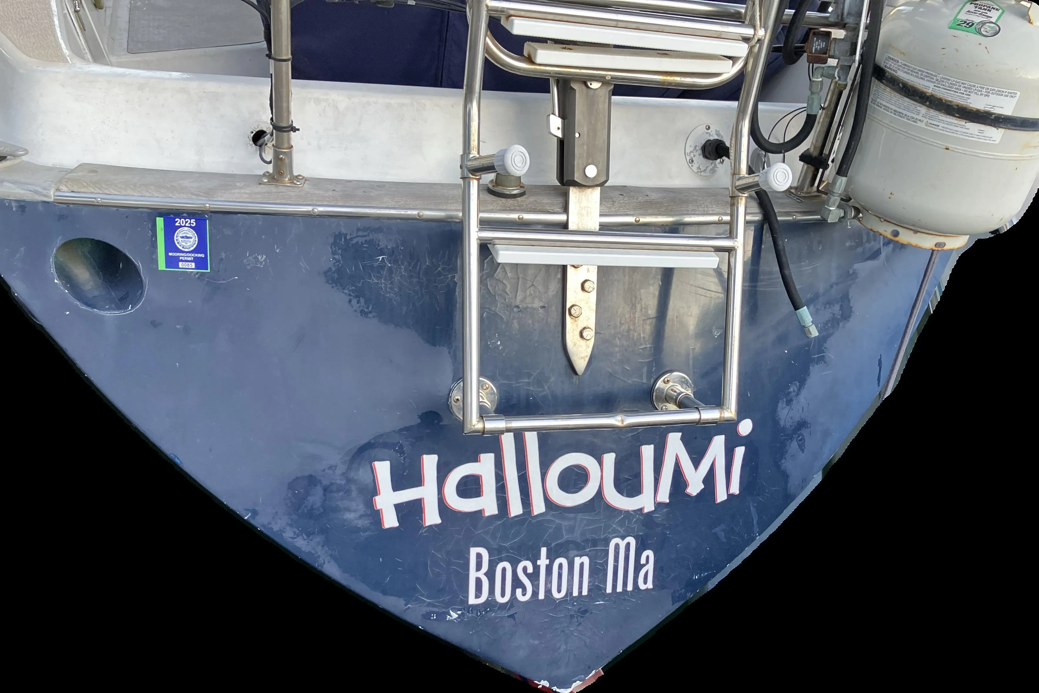 Sailboat stern with "Halloumi" name, Tartan 38 model, Boston, MA, 1976.