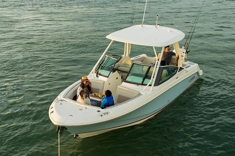 Blue Horizons II Yacht Photos Pics Manufacturer Provided Image: 2023 Boston Whaler 240 Vantage boat on water with passengers enjoying leisure time.