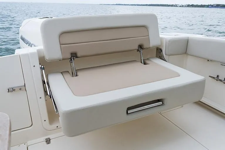 Blue Horizons II Yacht Photos Pics Manufacturer Provided Image: 2023 Boston Whaler 240 Vantage boat with foldable seating on deck.