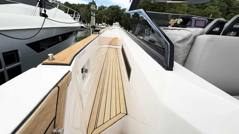  Yacht Photos Pics 2023 OKEAN 57 yacht with sleek deck design and luxurious seating.