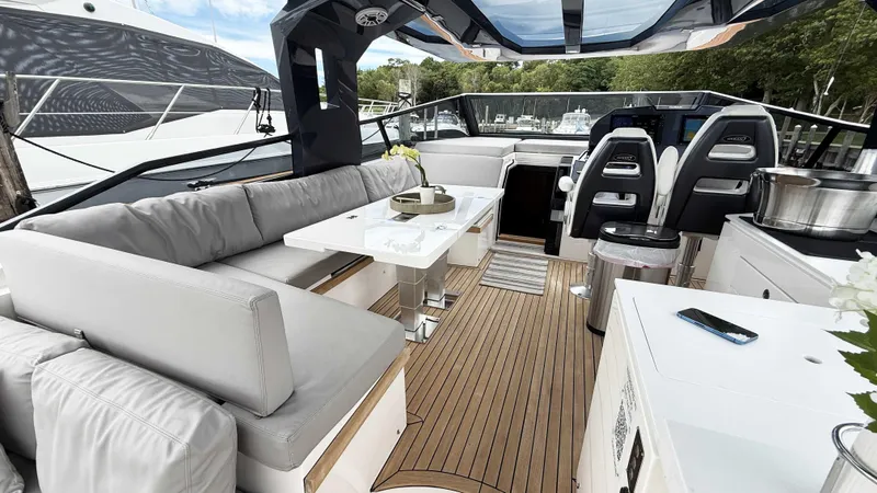  Yacht Photos Pics Luxurious 2023 OKEAN 57 yacht interior with elegant seating and modern amenities.