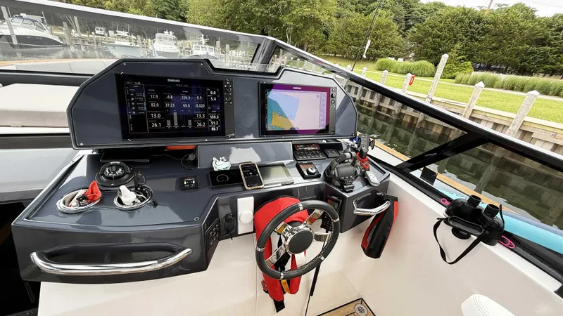  Yacht Photos Pics Helm of 2023 OKEAN 57 yacht with advanced navigation systems and controls.