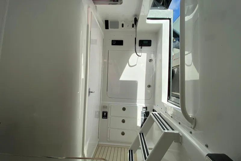  Yacht Photos Pics Interior of Midnight Express 43 Open boat, featuring sleek white design and modern equipment.