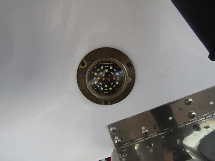  Yacht Photos Pics Compass on 2024 Axopar 37 Sun Top boat, mounted on white surface.