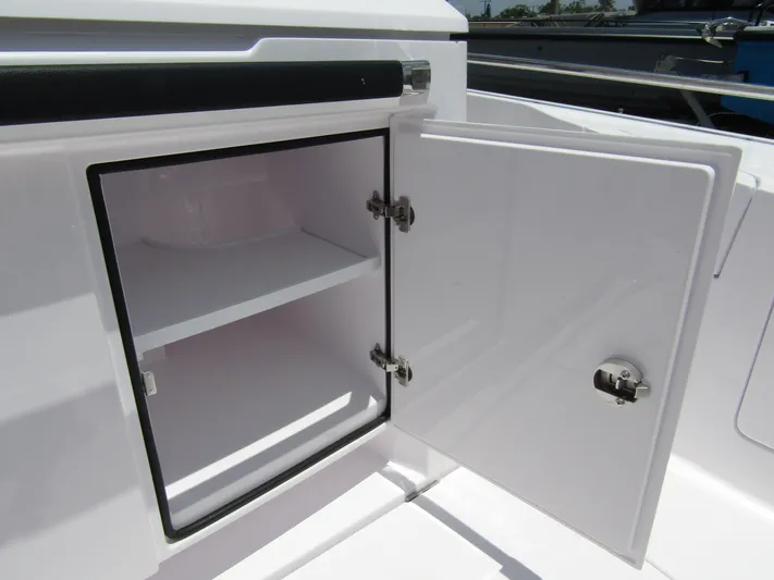  Yacht Photos Pics Open storage compartment on 2024 Axopar 37 Sun Top boat.