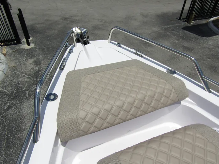  Yacht Photos Pics 2024 Axopar 37 Sun Top boat with quilted seating and stainless steel railings.