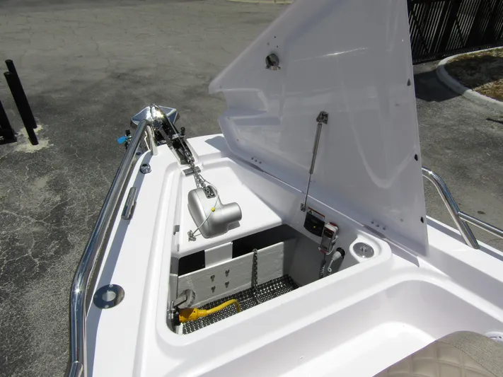  Yacht Photos Pics 2024 Axopar 37 Sun Top boat anchor compartment with open hatch.