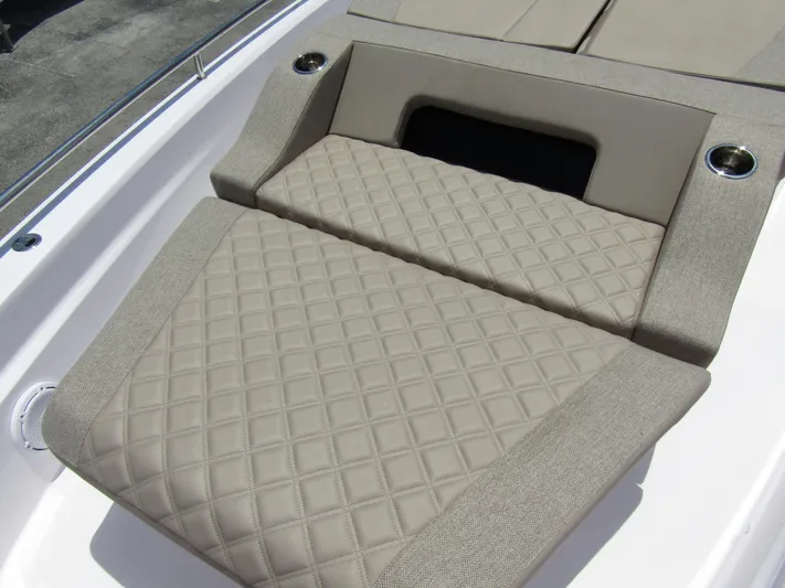  Yacht Photos Pics 2024 Axopar 37 Sun Top boat with luxurious quilted seating and cup holders.