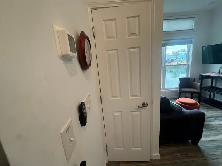  Yacht Photos Pics Interior of a 2019 Harbor Cottage Tiny Boat with living room.