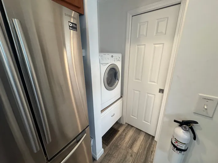  Yacht Photos Pics Compact laundry area in a 2019 tiny boat.
