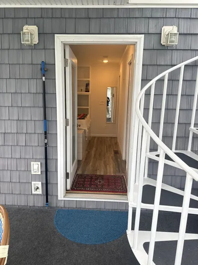  Yacht Photos Pics Entrance to a cozy tiny boat with spiral staircase.