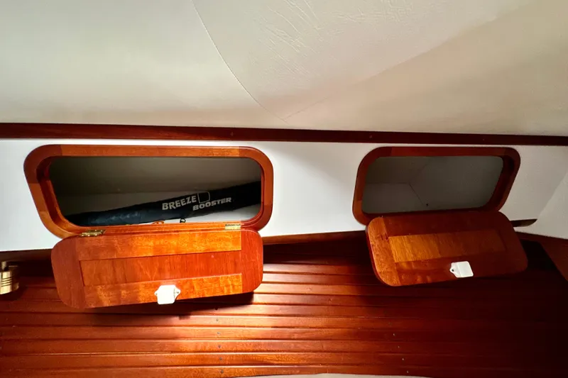 Belle Yacht Photos Pics Wooden interior cabinets on 2007 Legacy Yachts 34 Sport Express.