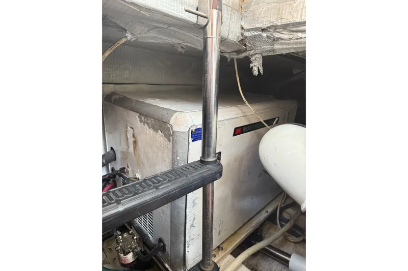 Belle Yacht Photos Pics Engine room of 2007 Legacy Yachts 34 Sport Express, featuring equipment and wiring.