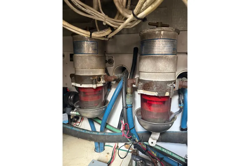 Belle Yacht Photos Pics Engine room of 2007 Legacy Yachts 34 Sport Express with fuel filter system.