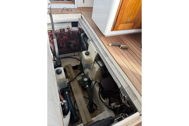 Belle Yacht Photos Pics Engine compartment of 2007 Legacy Yachts 34 Sport Express, showcasing mechanical components.